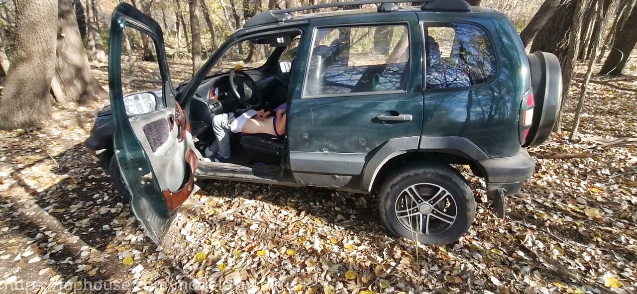 I spied on a straight guy while he was jerking off his huge penis in the car and gave him a hand job.