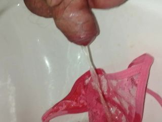 A piss after the wank in the pink panties