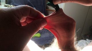 Three minutes of foreskin stretch in sunlight: pliers