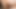 ストラポンズ・ガールズのシーン1_a美しいブルネットのレズビアンカップルがストラップオンでセックスを楽しんでいます。