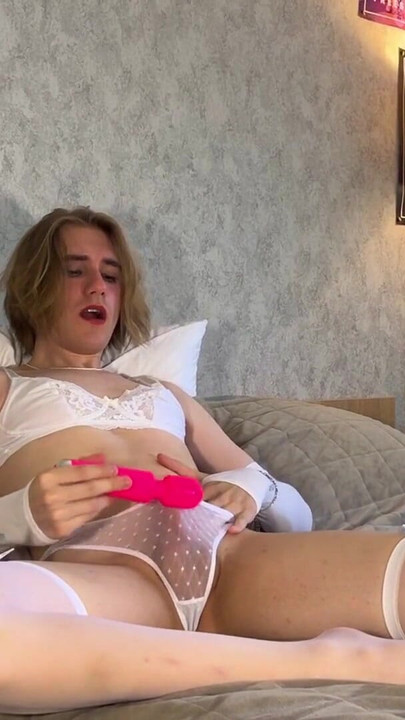 Unforgettable moment from "Loud Cute Femboy In White Lace Lingerie Playing with His Toys"