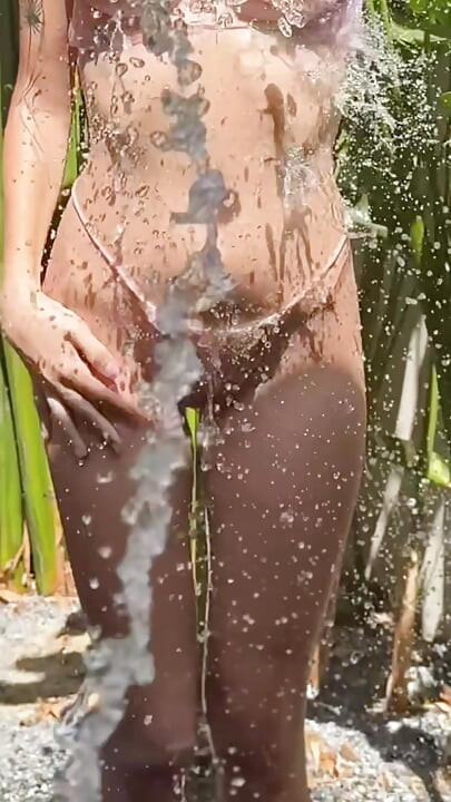striptease under running water and masturbation with beautiful fingers