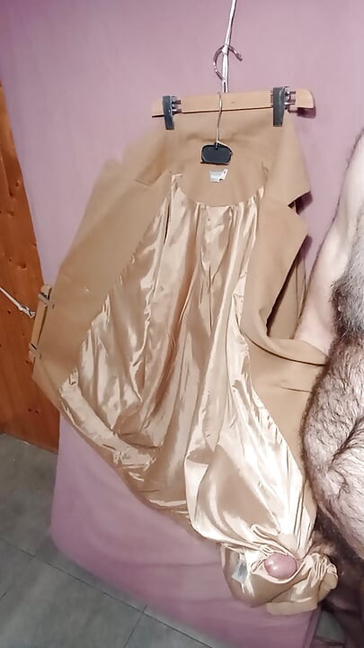Ejaculating in the shiny lining of a classy woolen ladycoat