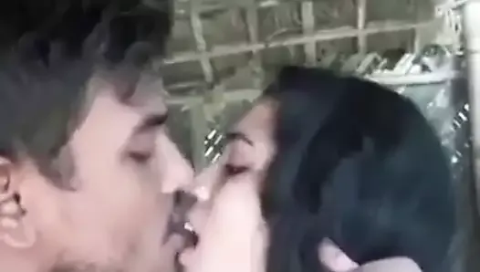 Cuple kissing in village