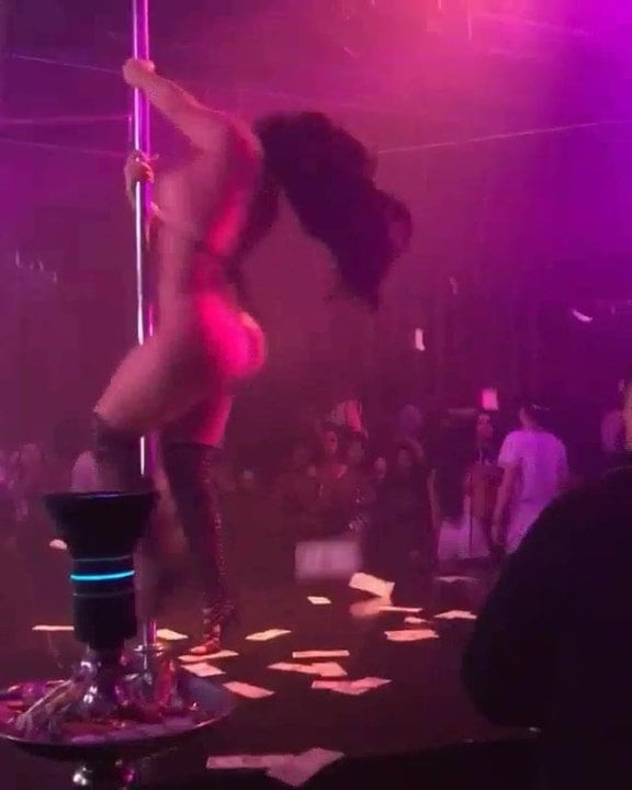 Striptease performing