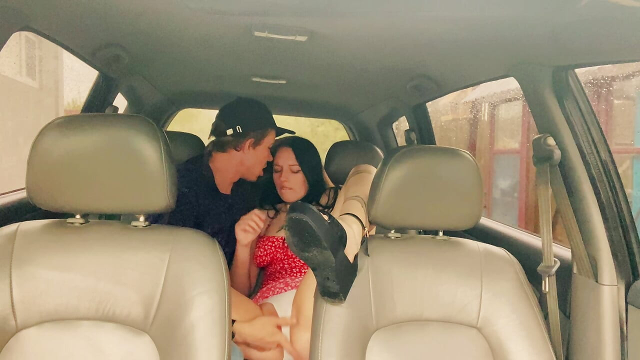 Wife cheating with a taxi driver in the car outside the house