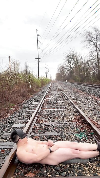 Rain-soaked Asian Muscle God in Jockstrap Bounces Pecs, Shows V-taper & Eats His Massive Load on Train Tracks