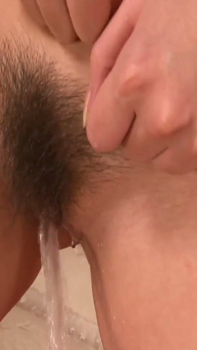 Chubby Japanese girl gets her hairy pussy fingered till she squirts | Clip 1