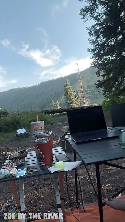Horny Granola Girl Fingers Her Pussy While Editing Porn At Her Desk in the Forest