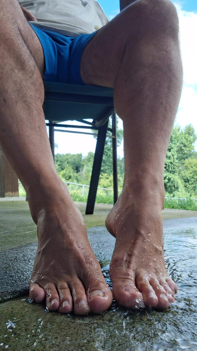 My hot manly feet playing in the water
