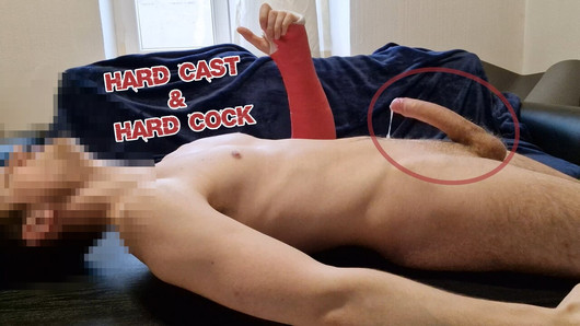 Twink with a cast is jerking his big uncut dick until he cums