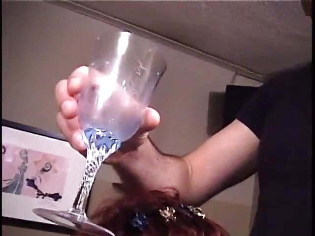 Brunette with small tits sucks a hard cock at home