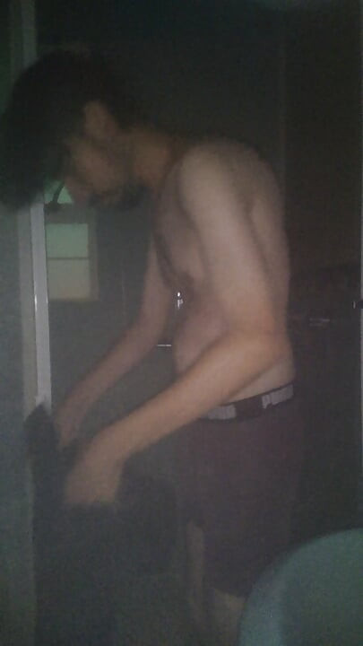 Man Showering with Flashlight On