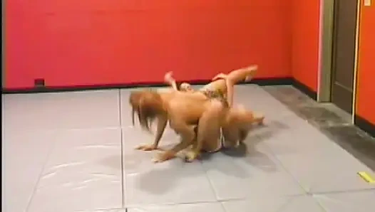 Big boobed ginger slut fucks a hot babe in the ring
