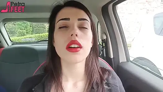 Good looking Petra smoking in her car