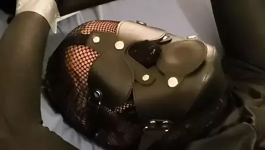 Ballgagged in overall catsuit. Cum with plastic hood