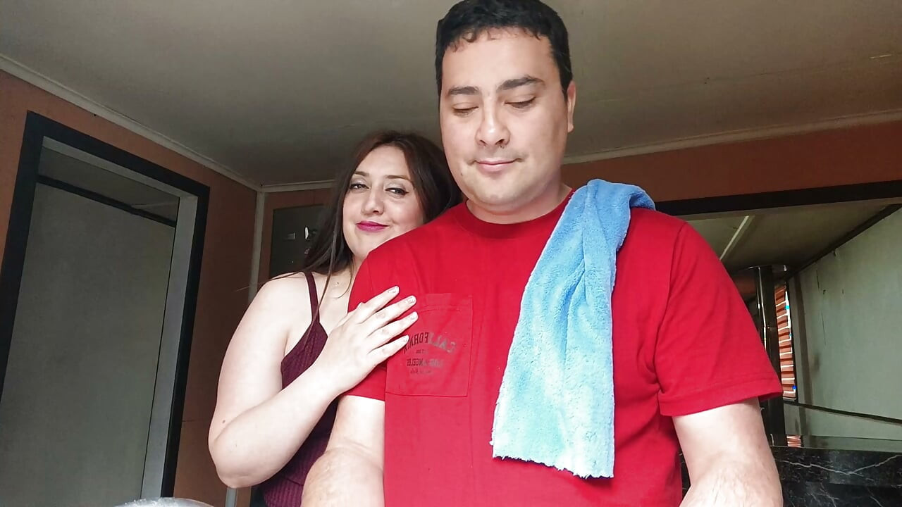 The cuckold is in the kitchen while his friend fucks his unfaithful wife right there.