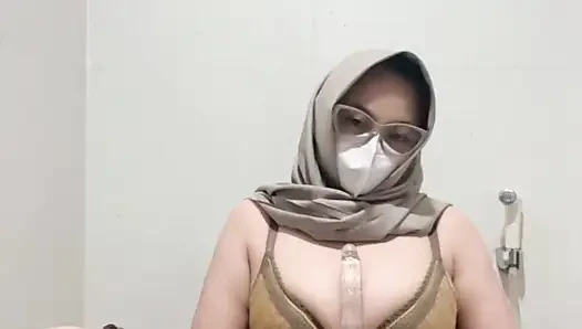 Brutal busty girl in bikini masturbates using squirt tipped dildo