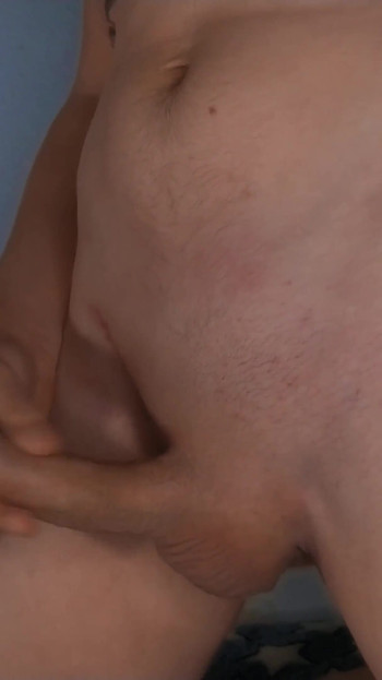 Hot guy jerks off a big dick and moans