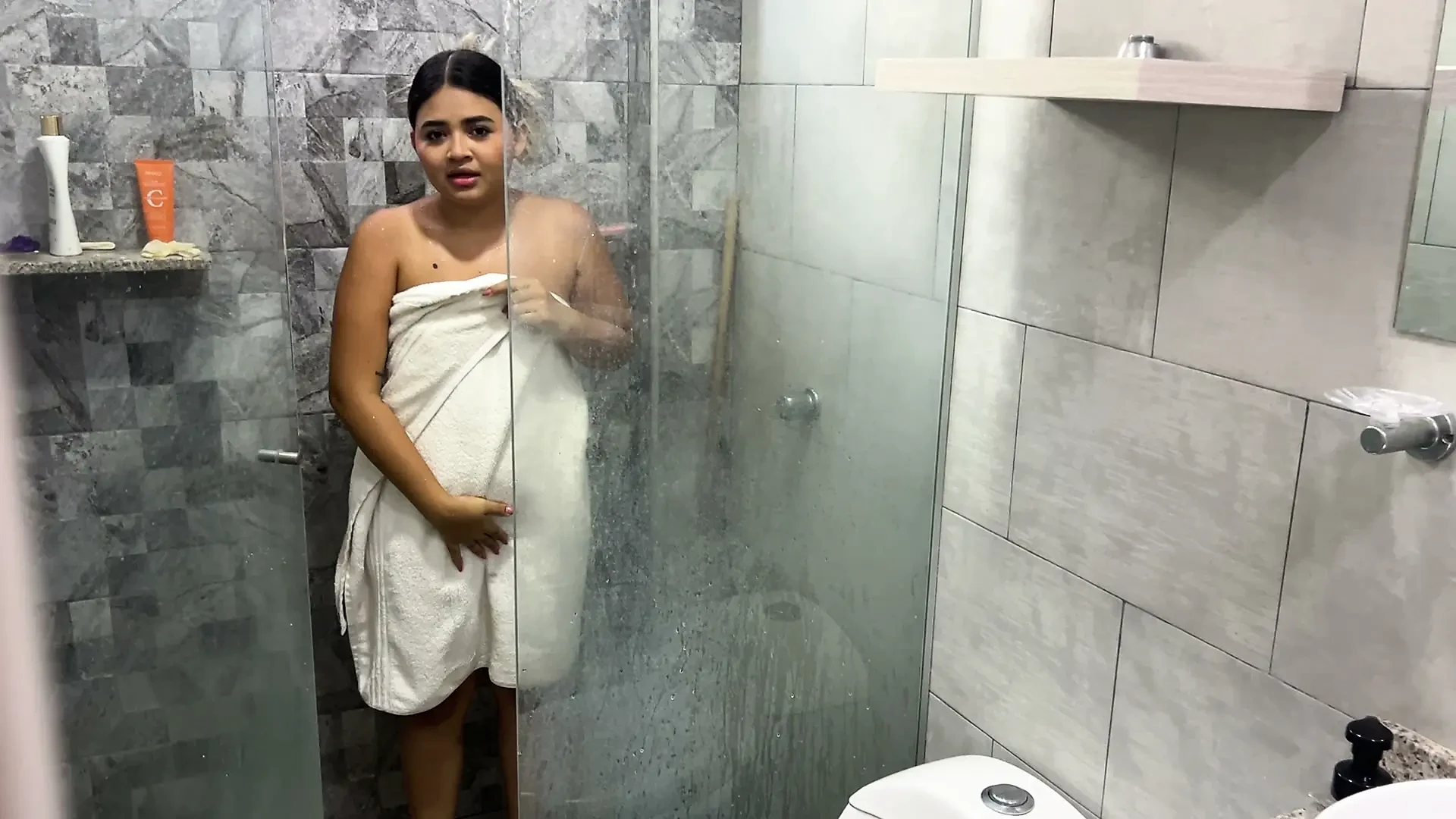 I couldn't help but masturbate while watching my stepsister in the shower