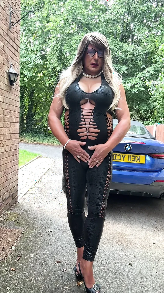 Sexy Crossdresser kellycd2022 in black pvc catsuit and heels