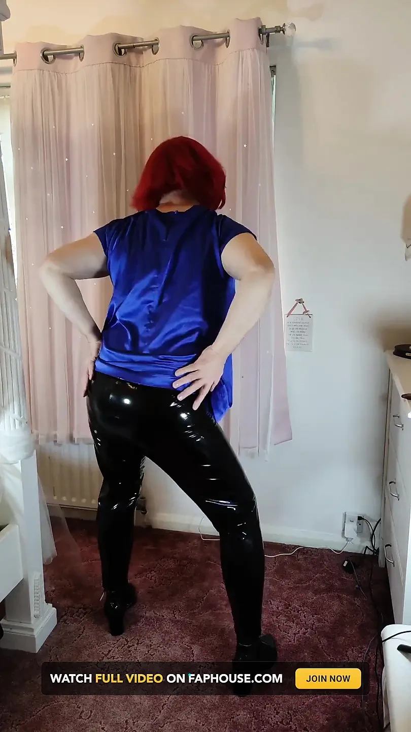 Hot crossdresser in satin blouse and pvc leggings