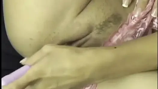 Trampy young brunette Nevaeh Ashton holds vibrator to her clit then shoves it in her shaved cunt