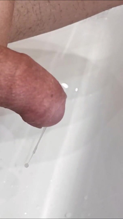 Must-share moment from "Slow motion flooding cumshot, cumming with a ball stretcher"