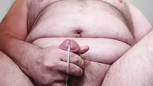 Thick cum dangling from my cock