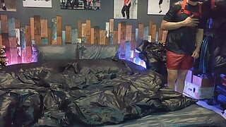 Cock Rubbing Down Jacket on Shiny Nylon Bed