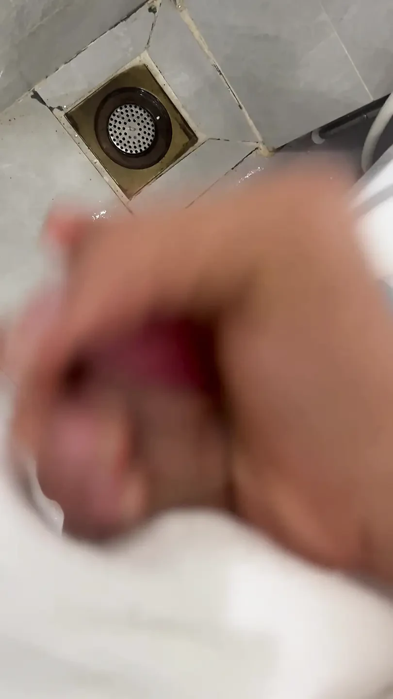 The young man escaped into the bathroom to relieve his needs.