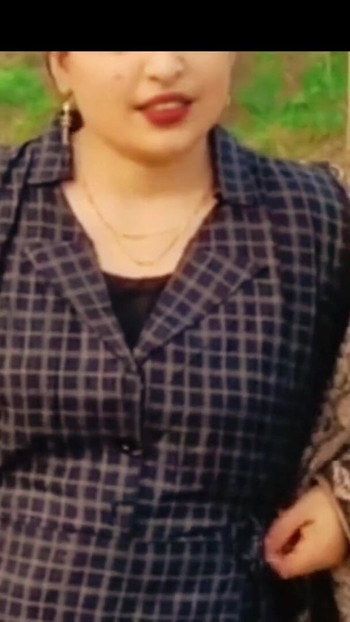 Key moment from "Beautiful housewife having sex with eggplant in her pussy. In the mustard garden.outdoor sex."