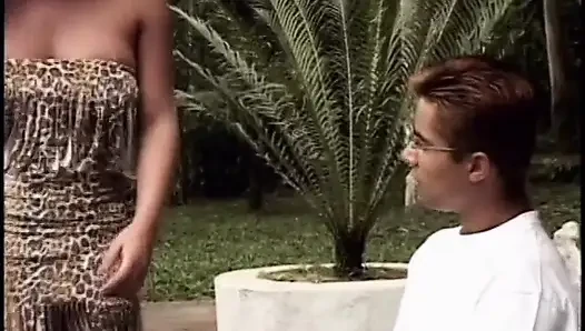 Curly haired tranny bends over to take it from the back