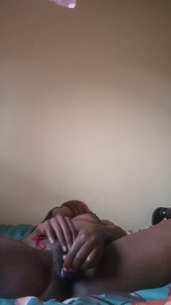Key moment from "Candy27 fucking her self with sex toy while wearing waite waisted bead."