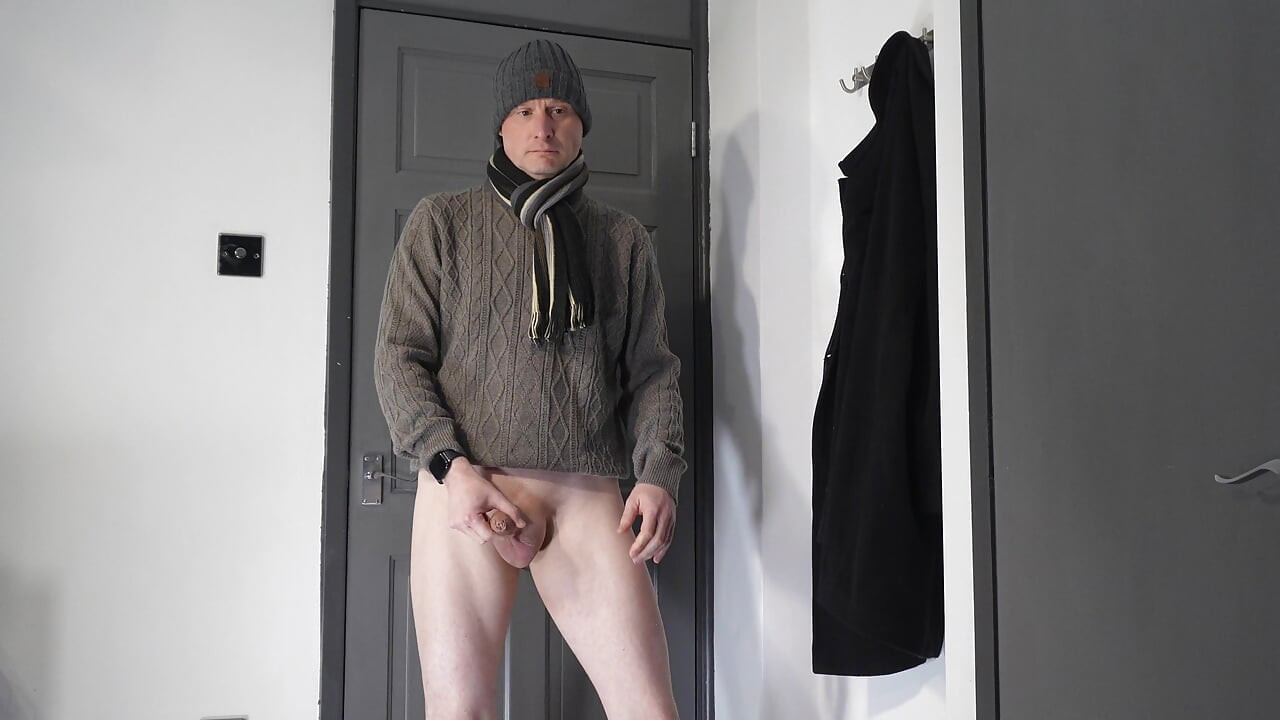 Man strips to just hat wanks his soft little cock till he cums, cum sprays as he ejaculates from his uncut shaved erection