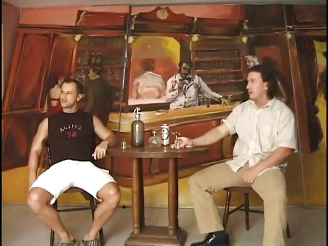 Blonde chick gets some threesome action with two studs in a bar