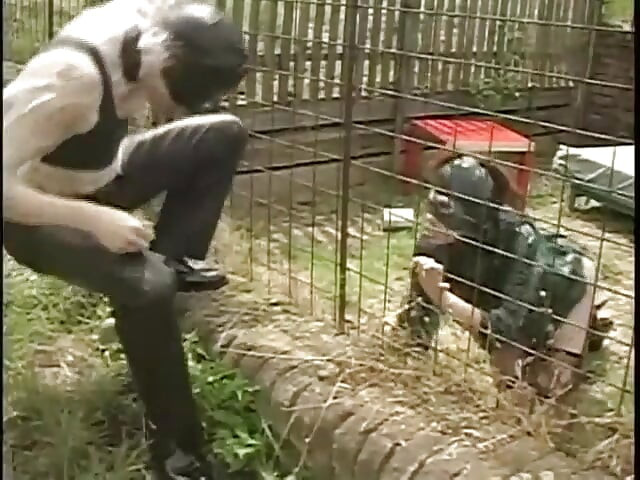 Slave in latex ass fucked in her cage