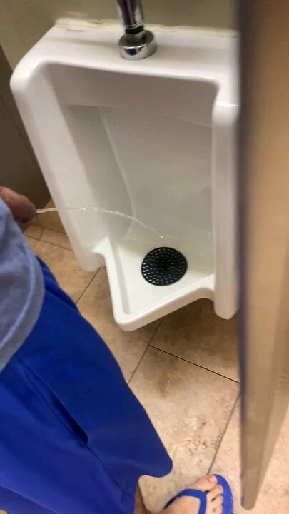 Pissing in a restroom
