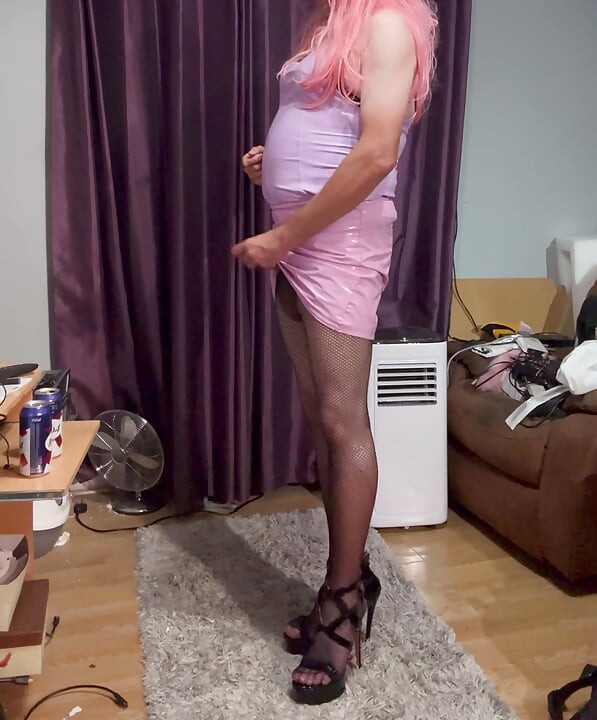 Dressed in pink pvc, fishnets and high heels and edging with lots of cum