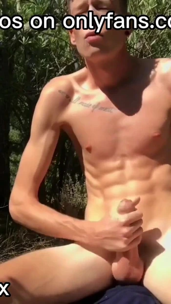 Key moment from "Naked Twink Craig Kennedy Strokes his big uncut cock in the Sun"