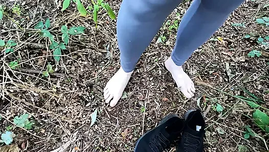 Completely naked in the field banging her breasts