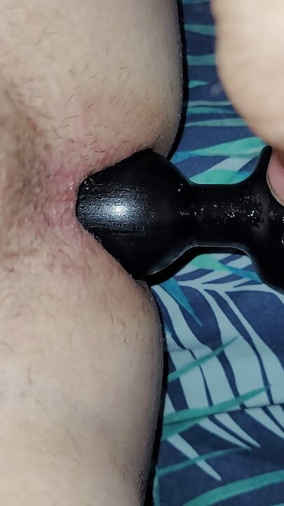Playing with Black butt plug