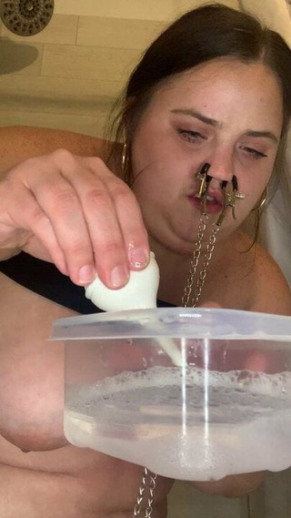 Fat humiliation fills her ass with soapy enema