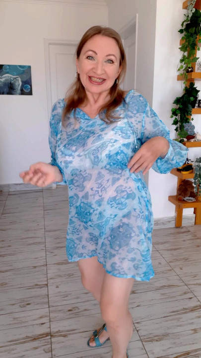 Busty granny dancing
