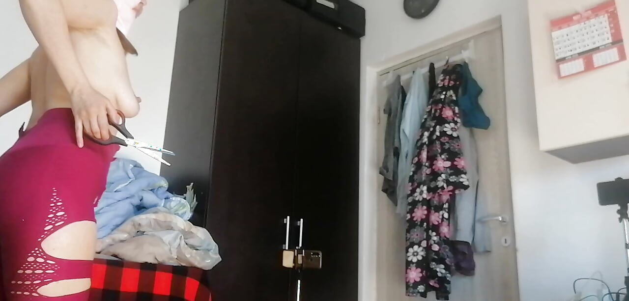 Amateur wife has fun trying on clothes and cutting them. Amateur wife sucking naked in the house