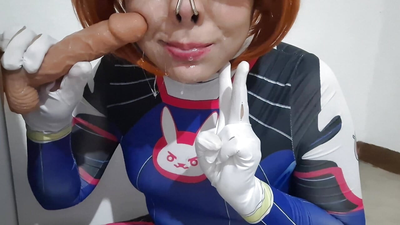 Femboy with Dva Cosplay and BDSM Nosehook Giving a Blowjob, Eating Cum and Deepthroat to Big Dildo