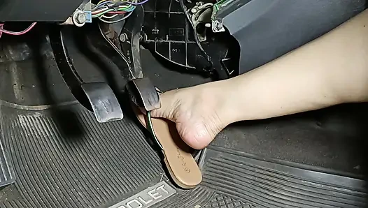 Accelerating and Pumping Racing Pedals Wearing Flip Flops