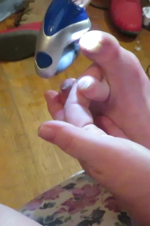 Nurse Vicki grinds her toe nails down with her electric Pedi egg tool ! Poor ugly toes need it real bad!