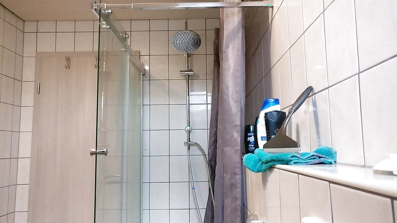 Taking a shower with a voyeur camera filming