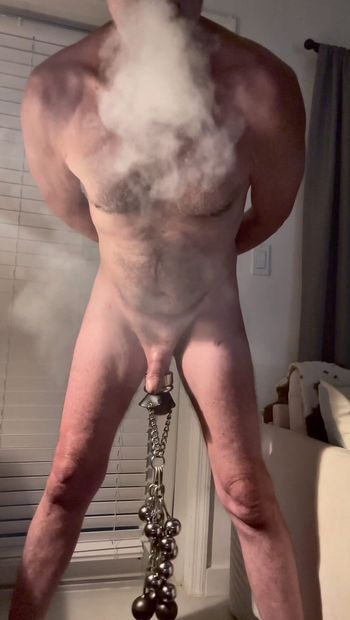 Feels so good blowing clouds while stretching my balls with 8 pounds of weight swinging from my nuts.